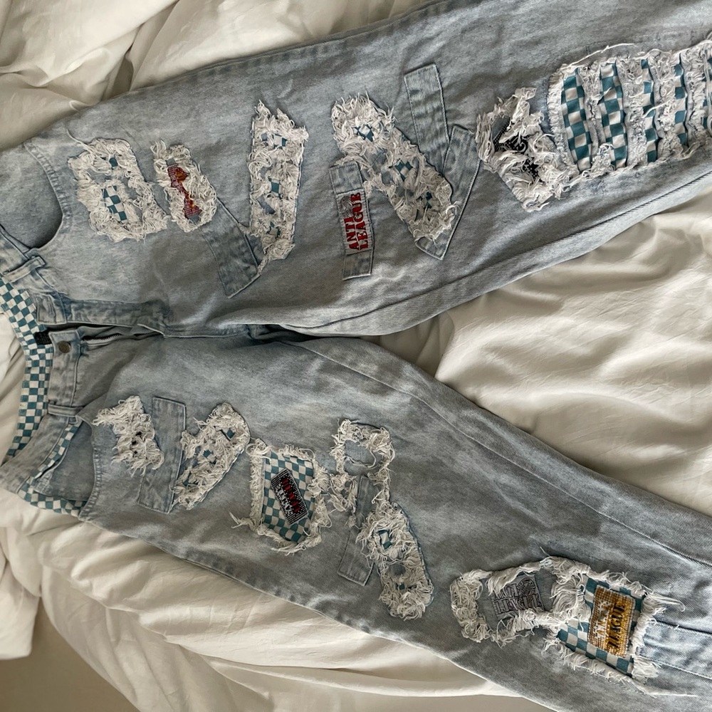 Size 12-14 Jeans, has a little stain on the back.